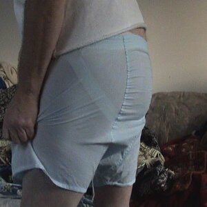 Strap visible under boxers